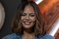 Chrissy Teigen visits Empire State Building in New York on May 17, 2024 to light up to celebrate JBL Fest and partnership with NAMM. (Photo by Lev Radin/Sipa USA