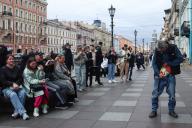 A homeless man shows his underpants for everyone to see on the embankment of the Griboyedov Canal in St. Petersburg. (Photo by Artem Priakhin \/ SOPA Images\/Sipa USA