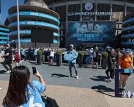A Man City fan has a selfie holding a home made poster saying hes travel 17006 KM from Sydney to Manchester during the Premier League match Manchester City vs West Ham United at Etihad Stadium, Manchester, United Kingdom, 19th May 2024 (Photo by Mark Cosgrove\/News Images) in Manchester, United Kingdom on 5\/19\/2024. (Photo by Mark Cosgrove\/News Images\/Sipa USA