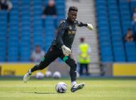 André Onana of Manchester United warms up before the Premier League match at the American Express Stadium, Brighton and Hove Picture by Graeme Wilcockson/Focus Images/Sipa USA 07940465341 19/05