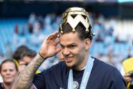 Ederson of Manchester City with the Premier League Trophy Crown on his head during the Premier League match Manchester City vs West Ham United at Etihad Stadium, Manchester, United Kingdom, 19th May 2024 (Photo by Mark Cosgrove/News Images) in Manchester, United Kingdom on 5/19/2024. (Photo by Mark Cosgrove/News Images/Sipa USA