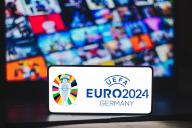 In this photo illustration, the UEFA European Football Championship (Euro 2024 Germany) logo is displayed on a smartphone screen. UEFA European Football Championship (Euro 2024 Germany) it is the main football championship between men