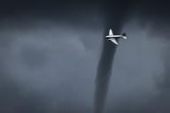 A mini-tornado forms behind a DC3 during the air show on May 18, 2024 in La Ferte-Alais, south of Paris, France. Frances premier air show is held each year at Cerny aerodrome, close to the picturesque town of La Ferte-Alais, just a short distance from Paris. The event itself takes place during the weekend of Pentecost, fifty days after Easter, and thus the date for any given year varies between mid-May and mid-June. Photo by Thomas Arnoux/Abaca/Sipa