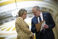 Senator Chuck Schumer (D-N.Y.), the Senate Majority Leader, speaks with an aide during the weekly Senate Democrat leadership press conference, at the U.S. Capitol, in Washington, D.C., on Tuesday, May 21, 2024. (Graeme Sloan/Sipa USA