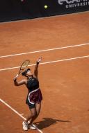 Naomi Osaka of Japan in action against Qinwen Zheng of China in the fourth round on Day Eight of the Internazionali BNL D