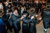 Hasidic orthodox, Jewish men, sing and dance during Lag Ba