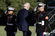 US President Joe Biden (C) boards Marine One beside US Marines, to depart from Fort Lesley J. McNair, in Washington, DC, USA, 31 May 2024. US President Biden and members of his family travel to Delaware