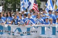 Young participants march while holding a banner along Fifth Avenue in New York City during the annual Israel Day Parade, on June 2, 2024. (Photo by Ryan Rahman/Pacific Press/Sipa USA