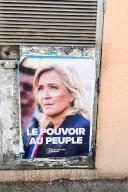 A campaign poster for Marine Le Pen hangs on a building in ?Saint-Didier?, Provence-Alpes-Côte d