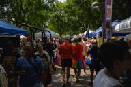 LOUISVILLE, KENTUCKY - JUNE 17: Festival attendees walk amongst the vendor booths at the Kentuckiana Pride Festival at Big Four Lawn on June 17, 2023 in Louisville, Kentucky. According to the American Civil Liberties Union, nearly 500 anti-LGBTQ+ bills have been introduced across the U.S. in state legislatures since the beginning of 2023. (Photo by Jon Cherry/Getty Images