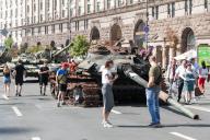 Residents and guests of the Ukrainian capital walk along Khreshchatyk Street in the centre of the Ukrainian capital and view destroyed Russian military equipment on display to mark Ukraine