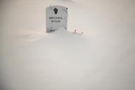 A memorial gravestone for Breonna Taylor is surrounded by snow at Say Their Names Cemetery on December 12, 2021 in Minneapolis, Minnesota. Photo by Chris Tuite/ImageSPACE/Sipa