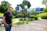 Seah Liang Chiang, founder and CEO of Tiny Pod with his "tiny" pop-up hotels at Gardens by the Bay, 30 April 2024. The hotels are repurposed from standard 40-foot metal shipping containers
