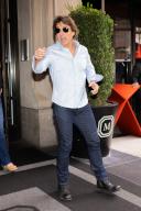 Tom cruise exits his New York City hotel smiling while waving to his fans Pictured: Ref: SPL9005579 090723 NON-EXCLUSIVE Picture by: WavyPeter / SplashNews.com Splash News and Pictures USA: 310-525-5808 UK: 020 8126 1009 eamteam