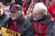 Actress and political activist Jane Fonda, left, joined by Ben Cohen and Jerry Greenfield of Ben and Jerry?s Ice Cream, participates in a climate protest on Capitol Hill in Washington D.C., U.S., on Friday, November 8, 2019. Activists then marched ...