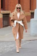 Stylist Shea Marie is seen wearing a camel hair coat with oversized white belt and knee-length matching boots in Soho in New York City. Shea recently became engaged to Andres Fanjul. Pictured: Shea Marie Ref: SPL5139166 090120 NON-EXCLUSIVE ...