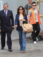 Mexican actress, director and producer Salma Hayek arrives at Marco Polo Airport in Venice, Italy to attend the Palazzo Grassi Art Museum opening.. .Pictured: Salma Hayek. . Ref: SPL283753 010611 .Picture by: Maurizio La Pira / Splash News ...