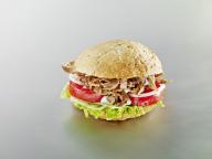 Doner kebab meat sandwich with tomatoes and onions
