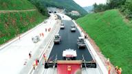 The unmanned automatic amortization paving and compacting machines are constructing the expressway in Bazhong,Sichuan,China on 24th June, 2021.(Photo by TPG/cnsphotos