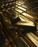 Gold bars stacked in rows concept 3d render