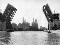 Chicago, Illinois, September 13, 1937 The old crumbling piling is gone and this steel and concrete bridge and highway greet ships as they enter the Chicago River from lake Michigan. The bridge and drive are links in the north-south Lake Shore Drive
