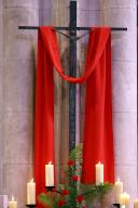 Saint Francois de Sales Basilica. Wooden cross with red cloth wrapped around, crucifix and resurrection of Jesus. Thonon. France