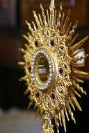 Eucharist (Blessed Sacrament) inside the Monstrance (Ostensory) during Eucharistic adoration. Cruseilles. France