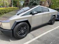 Tesla Cybertruck, electric vehicle parked on street in Queens, New York