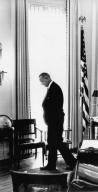 Washington, D.C.: December 11, 1965 President Lyndon Johnson paces the floor in his White Office while analyzing a recent problem.
