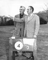 United States: c. 1954 Professional golfer Johnny Farrell at left with noted golf course architect Robert Trent Jones.