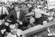 Memphis, Tennessee: 1960 Senator Kennedy is greeted in Memphis by supporters on his arrival at the airport. Senator Albert Gore is seated beside him and Memphis mayor Henry Loeb is at lower left.