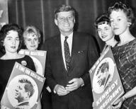 Racine, Wisconsin: March 21, 1960 A group of young Democrats hold Kennedy posters as they greet Senator John F. Kennedy at the Racine convention.