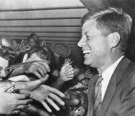 West Palm Beach, Florida: November 11, 1960 President-elect John F. Kennedy wears a big smile as hundreds of well-wishers greet him at the West Palm Beach Airport.