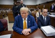 Former President Donald Trump waits for his criminal trial to begin at Manhattan Criminal Court in New York on Thursday, May 2, 2024. Trump\'s trial is entering it\'s third week on charges he allegedly falsified business records to cover up a sex scandal during the 2016 presidential campaign. Pool photo by Doug Mills