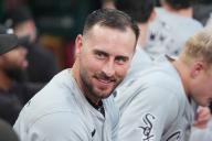 Chicago White Sox Paul DeJong talks with teammates on the bench before a game against the St. Louis Cardinals at Busch Stadium in St. Louis on Friday, May 3, 2024. Photo by Bill Greenblatt