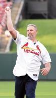 Former St. Louis Cardinals pitcher Cal Eldred throws a ceremonial first pitch before the Chicago White Sox-St. Louis Cardinals baseball game at Busch Stadium in St. Louis on Friday, May 3, 2024. Photo by Bill Greenblatt