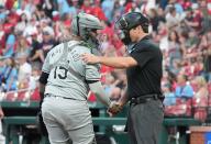 Home plate umpire Ben May greets Chicago White Sox catcher Martin Maldonado in the first inning against the St. Louis Cardinals at Busch Stadium in St. Louis on Friday, May 3, 2024. Photo by Bill Greenblatt