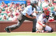 Home Plate umpire C.B. Bucknor leans in on St. Louis Cardinals catcher Willson Contreras to make the call during a game with the Chicago White Sox at Busch Stadium in St. Louis on Saturday, May 4, 2024. Photo by Bill Greenblatt
