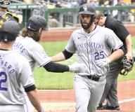 Colorado Rockies catcher Jacob Stallings (25) celebrates his two run 414 feet homer to center field with in the first inning at PNC Park on Sunday May 5, 2024 in Pittsburgh. Photo by Archie Carpenter
