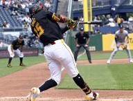 Pittsburgh Pirates shortstop Oneil Cruz (15) connects for a 429 feet homer in the sixth inning against the Colorado Rockies at PNC Park on Sunday May 5, 2024 in Pittsburgh. Photo by Archie Carpenter