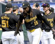 Pittsburgh Pirates shortstop Oneil Cruz (15) congradulates Pittsburgh Pirates pitcher David Bednar (51) following the 5-3 win against the Colorado Rockies at PNC Park on Sunday May 5, 2024 in Pittsburgh. Photo by Archie Carpenter
