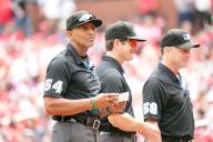 Major League umpires (L to R) C.B. Bucknor, Ben May and Dan Iassogna wait for the lineup card exchange at home plate, before the Chicago White Sox-St. Louis Cardinals baseball game at Busch Stadium in St. Louis on Sunday, May 5, 2024. Photo by Bill Greenblatt