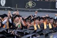 Engineering students cheer during Commencement at Folsom Stadium at the University of Colorado, in Boulder, Colorado on Thursday, May 9, 2024. Some 9,300 students graduated during the program that was addressed by Commencement speaker Steve Wozniak. Photo by Pat Benic