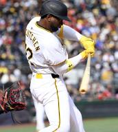 Pittsburgh Pirates outfielder Andrew McCutchen (22) reaches first on an infield single and later scores in the third inning against the Chicago Cubs at PNC Park on Saturday May 11, 2024 in Pittsburgh. Photo by Archie Carpenter