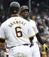 Pittsburgh Pirates outfielder Michael A. Taylor (18) celebrates his homer that scores Pittsburgh Pirates catcher Yasmani Grandal (6) in the fourth inning at PNC Park on Saturday May 11, 2024 in Pittsburgh. Photo by Archie Carpenter