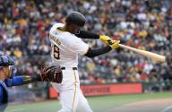 Pittsburgh Pirates outfielder Michael A. Taylor (18) hits a two run homer in the fourth inning against the Chicago Cubs at PNC Park on Saturday May 11, 2024 in Pittsburgh. Photo by Archie Carpenter