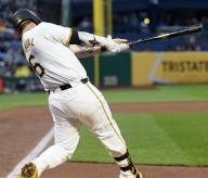 Pittsburgh Pirates catcher Yasmani Grandal (6) homers in the fifth inning of the Pirates 10-9 win against the Chicago Cubs at PNC Park on Saturday May 11, 2024 in Pittsburgh. Photo by Archie Carpenter