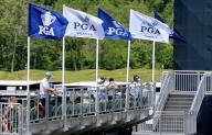Golf fans watch their favorite golfer on the practice green during the first practice day for the 2024 PGA Championship at Valhalla Golf Course on Monday, May 13, 2024 in Louisville, Kentucky. Photo by John Sommers II