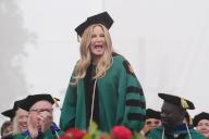 Actress Jennifer Coolidge yells out as she is introduced before being given an honorary Doctor of Fine Arts degree, during graduation ceremonies at Washington University in St. Louis on Monday, May 13, 2024. Coolidge is an award winning actor known for her numerous iconic roles in film and on television. Photo by Bill Greenblatt