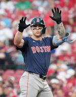 Boston Red Sox batter Tyler O\'Neill motions to his dugout after reaching first base with a single in the second inning against the St. Louis Cardinals at Busch Stadium in St. Louis on Friday, May 17, 2024. Photo by Bill Greenblatt